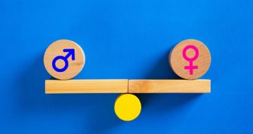 gender-equality-concept-male-female-symbol-balancing-seesaw_121826-1942
